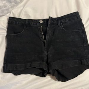 Black jean shorts, size 6. Too tight on me. Worn a couple of times.